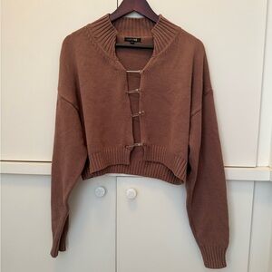 Mauve sweater with clothes pin closure